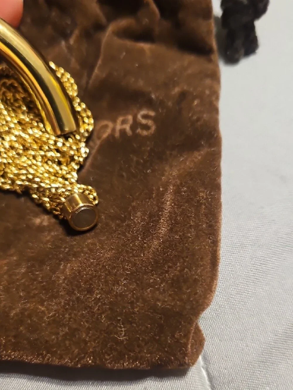 Michael Kors gold tone